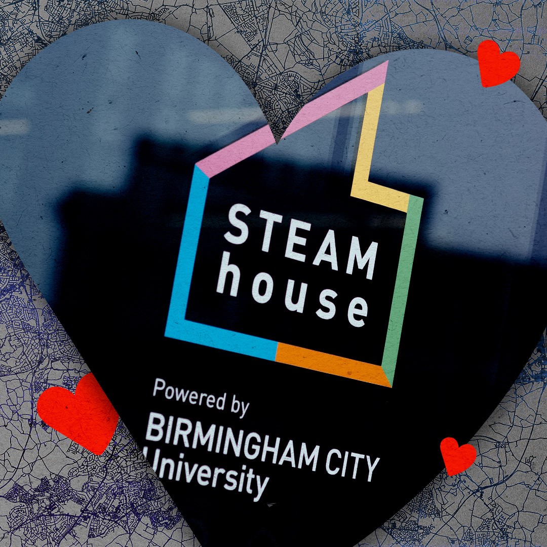 The STEAMhouse logo on the window of the STEAMhouse, “Powered by Birmingham City University.”